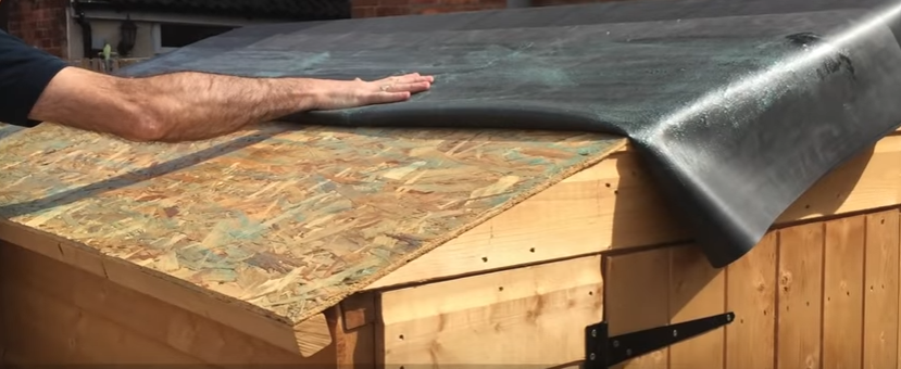 Roll the membrane over the glued roof